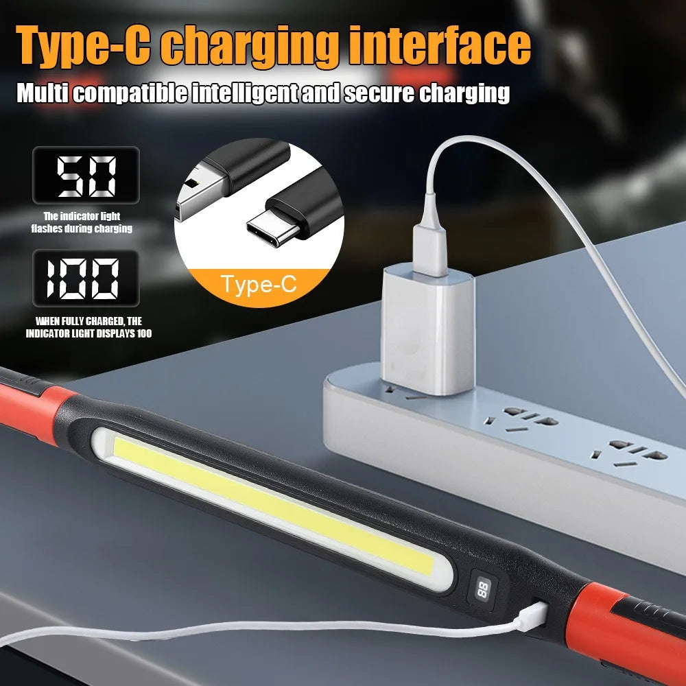Rechargeable LED work light with Type-C charging port connected to power strip, digital battery display