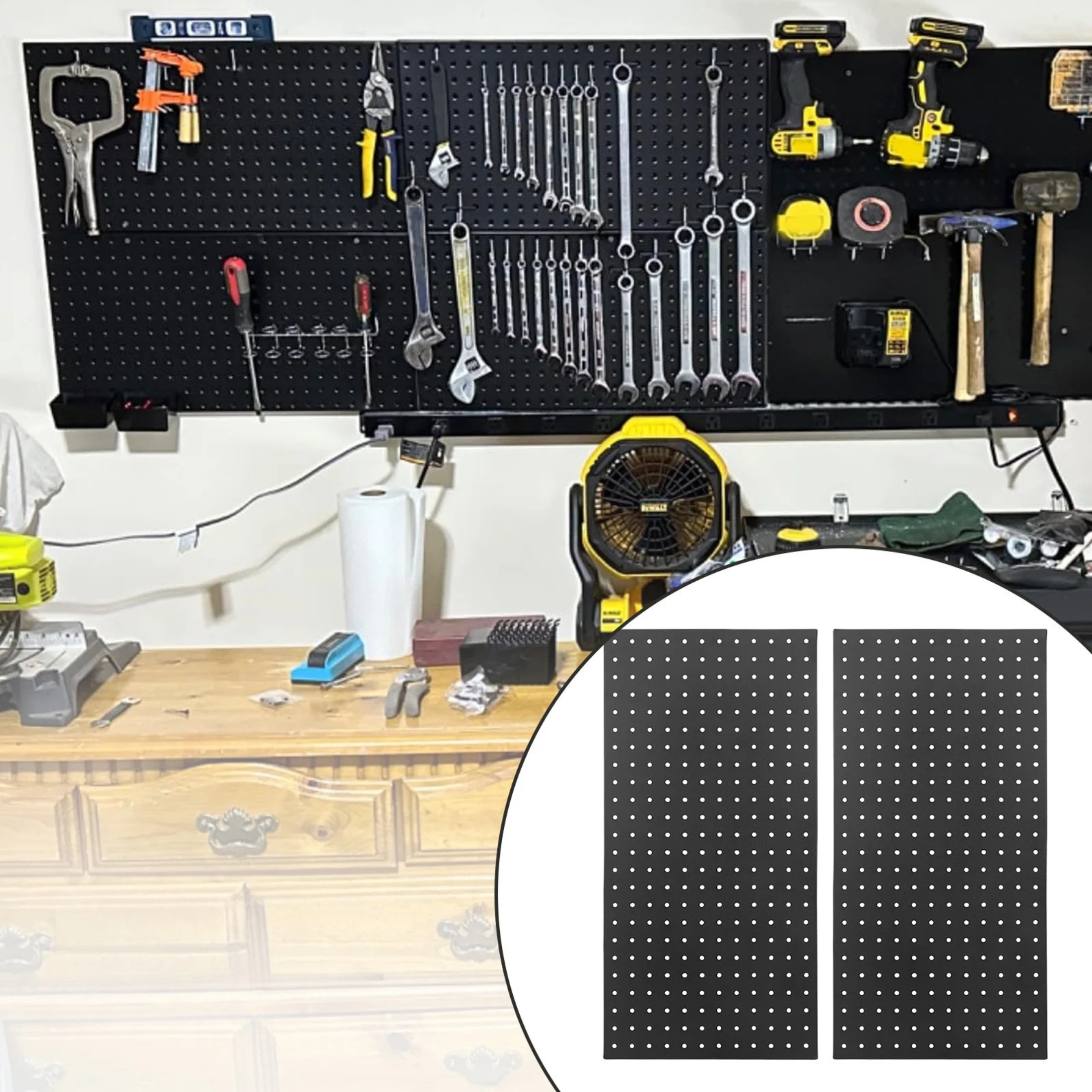 Black pegboard wall organizer with tools, power drills, and accessories in a garage workspace