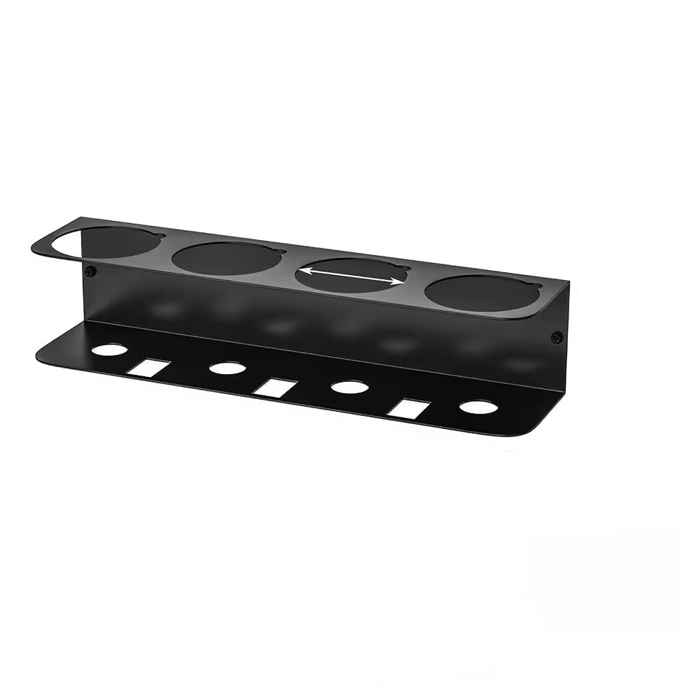 Wall-mounted black metal tool holder with multiple circular and rectangular slots for garage organization
